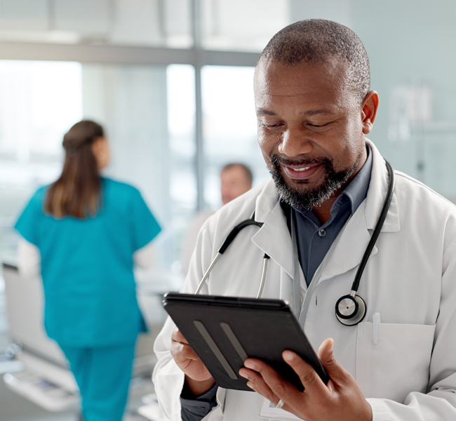 doctor holding tablet